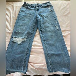 Slightly worn and distressed women’s jeans